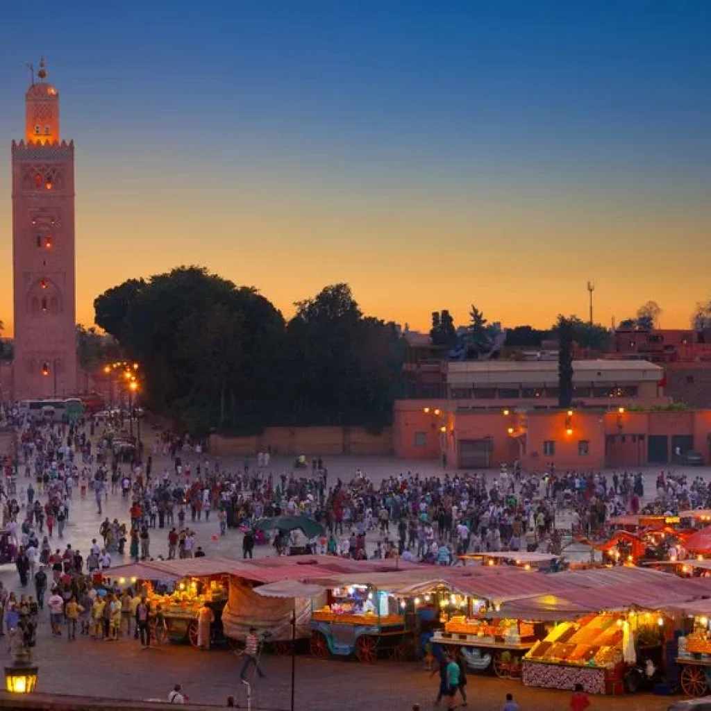 Visit to Marrakech And Aspects 2 Vibrant and bustling Jemaa el-Fnaa Square in Marrakech, Morocco, showcasing traditional market stalls, street performers, and cultural activities.